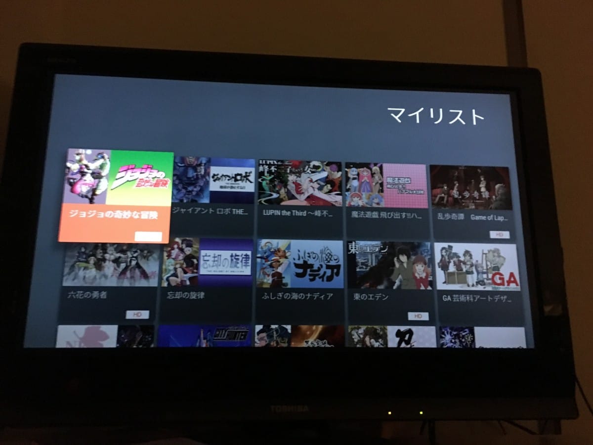 A large flat screen tv sitting on display