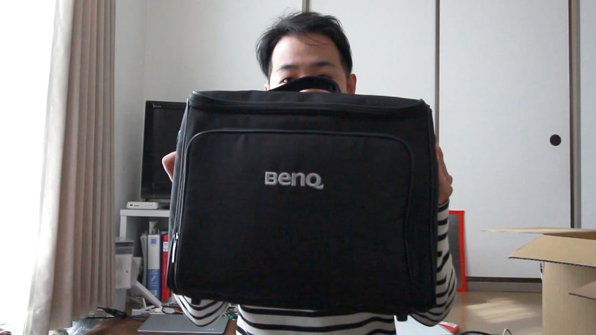 Person in a black suitcase