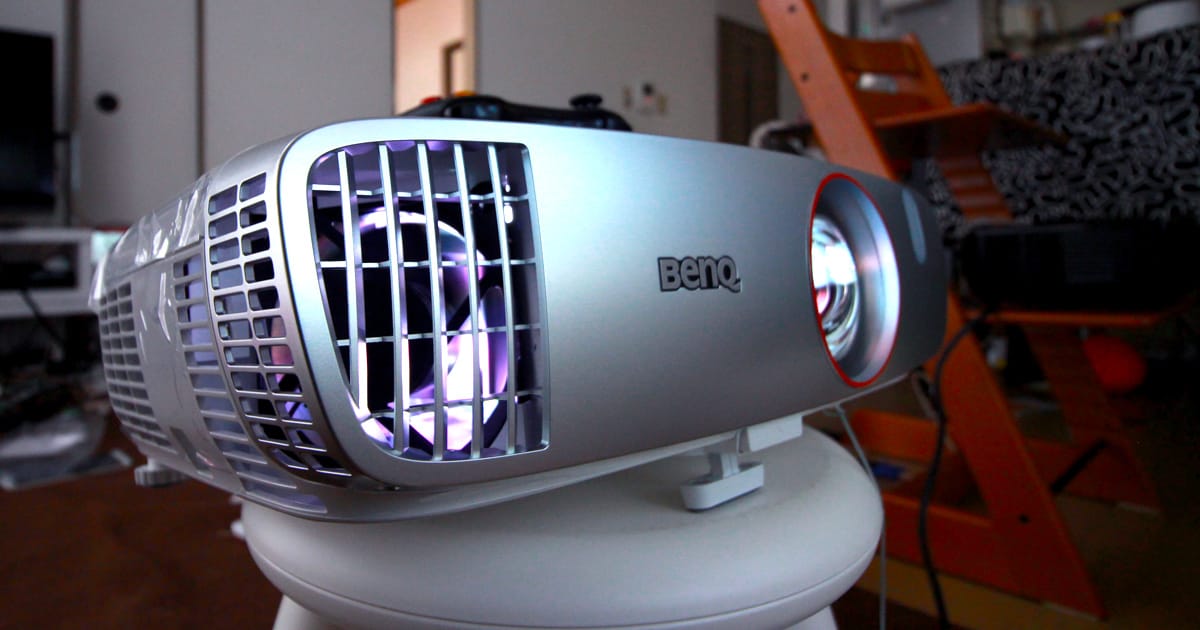 A desk with a mouse and a toilet