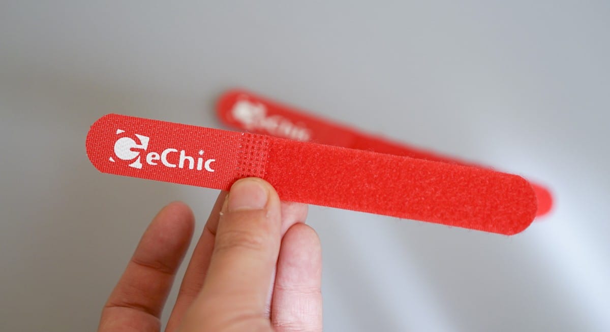 A hand holding a remote