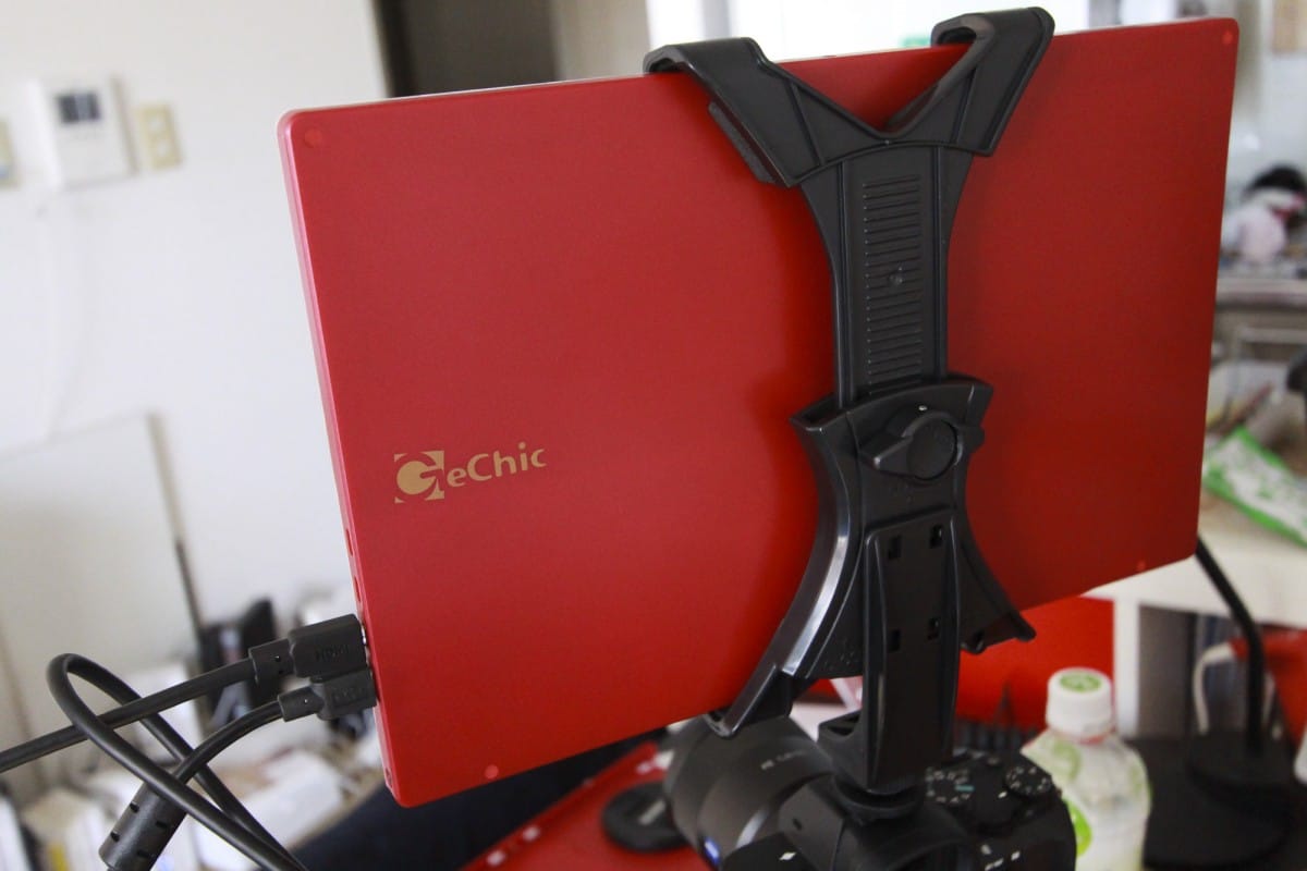 A desk with a red chair