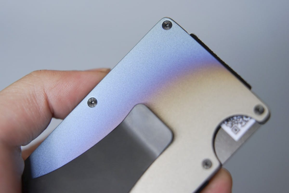 DSC09444 A hand holding a pair of scissors