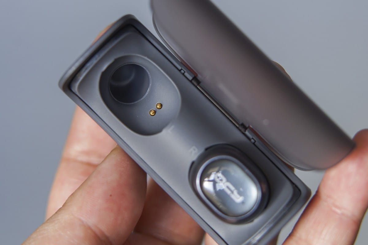 A hand holding a cell phone