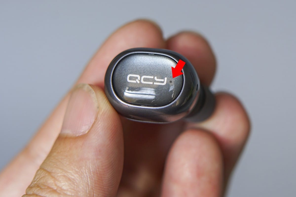 A hand holding a cell phone