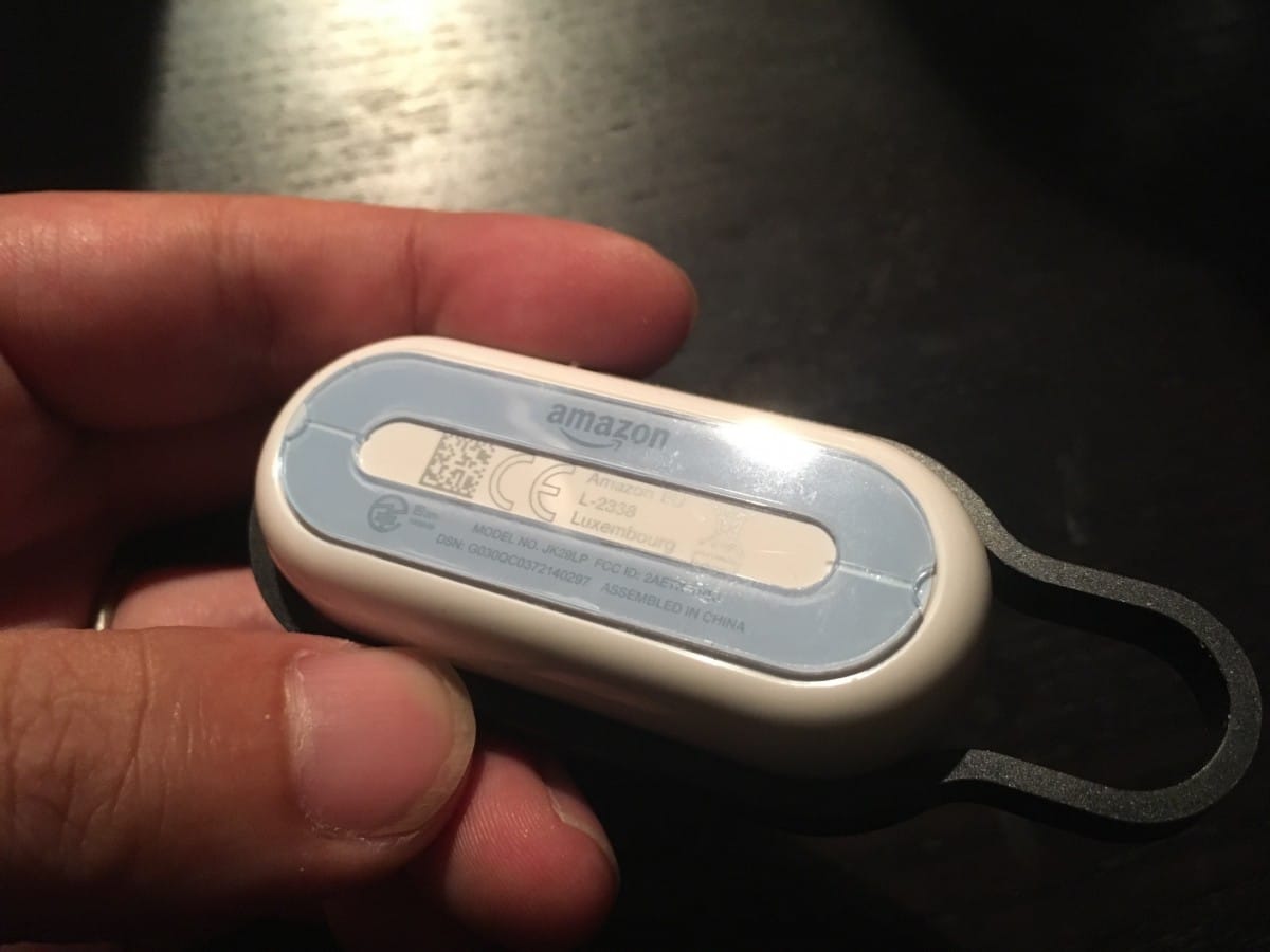 IMG_4117 A hand holding a remote control