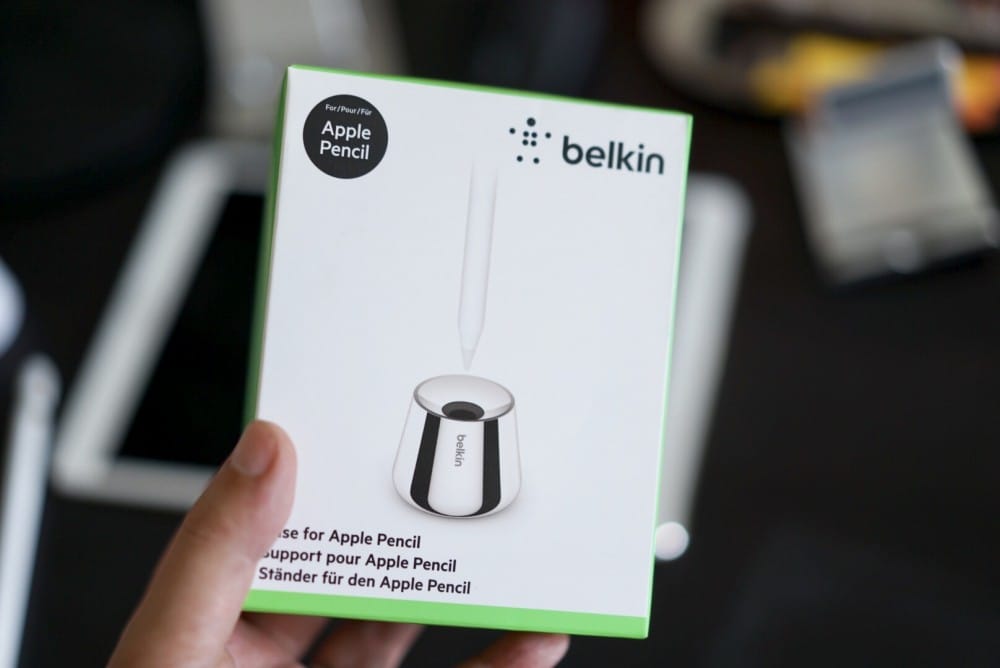 A hand holding a cell phone