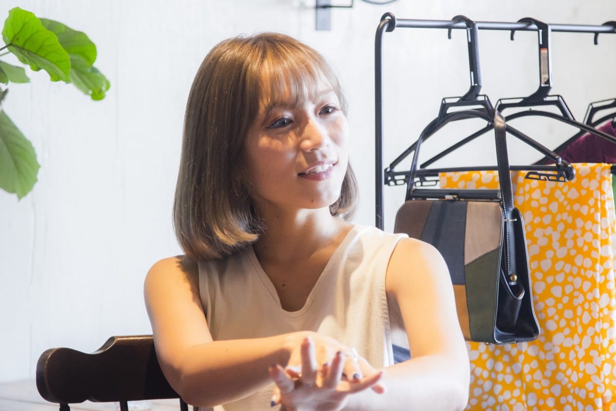 A young girl sitting on a table
