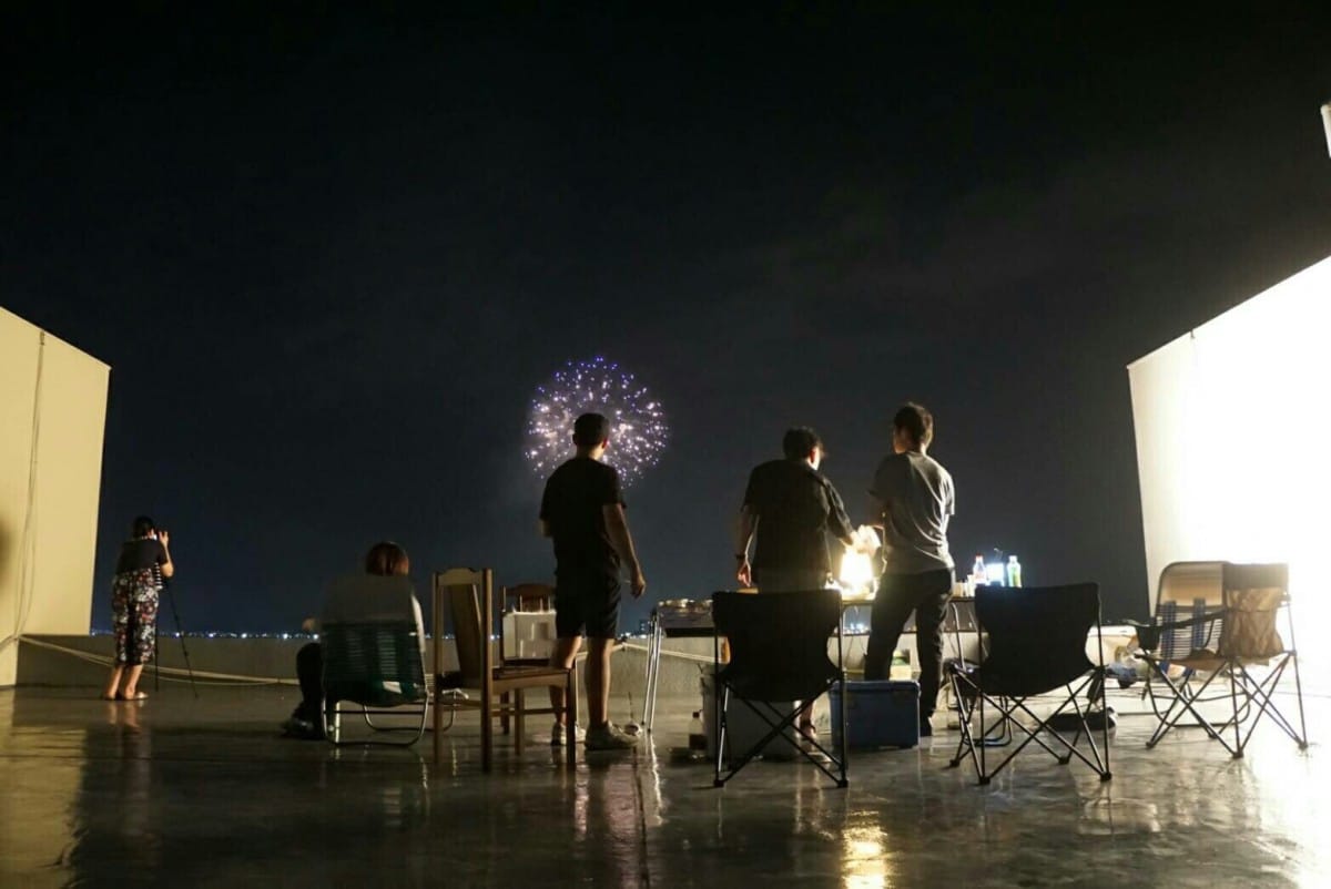 A group of people standing in a room